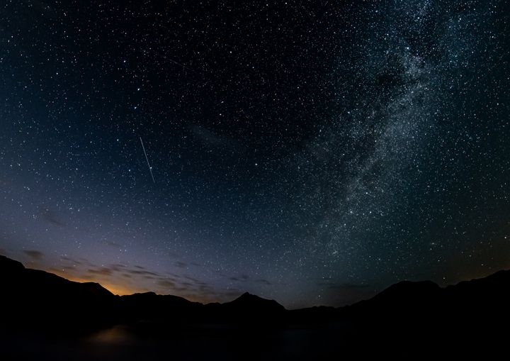 Meteors along the Milky Way in the sky on July 18, 2023 in Leon, Spain. 