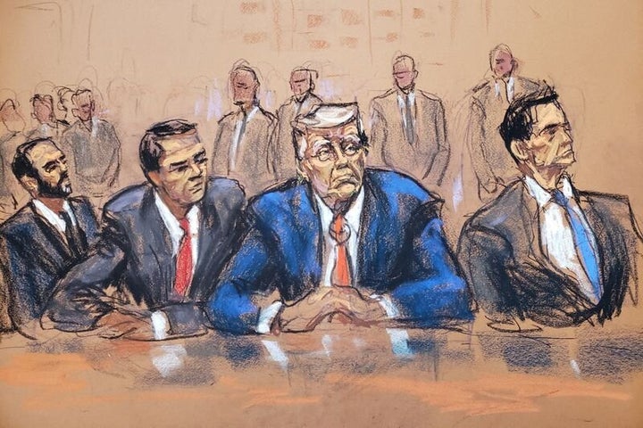 A courtroom sketch shows former President Donald Trump sitting between his attorneys as he faces charges related to efforts to overturn his 2020 election loss, at federal court in Washington on Aug. 3. At far left is U.S. special counsel Jack Smith.