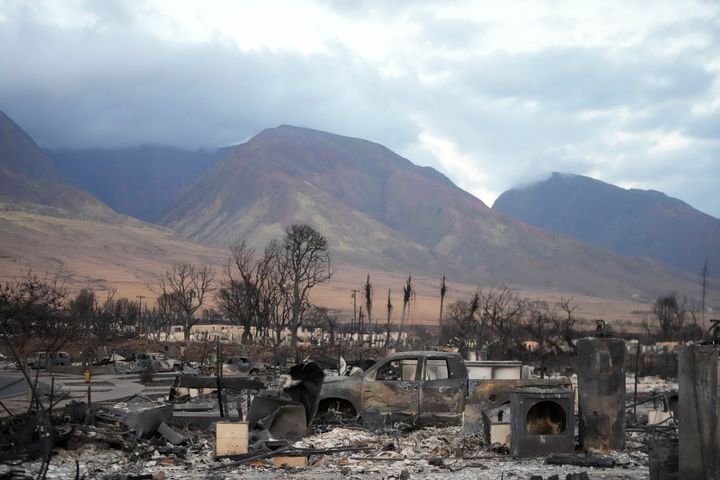 Wildfire wreckage is shown Thursday, Aug. 10, 2023, in Lahaina, Hawaii. Hawaii emergency management records show no indication that warning sirens sounded before people ran for their lives from wildfires on Maui that wiped out a historic town. (AP Photo/Rick Bowmer)