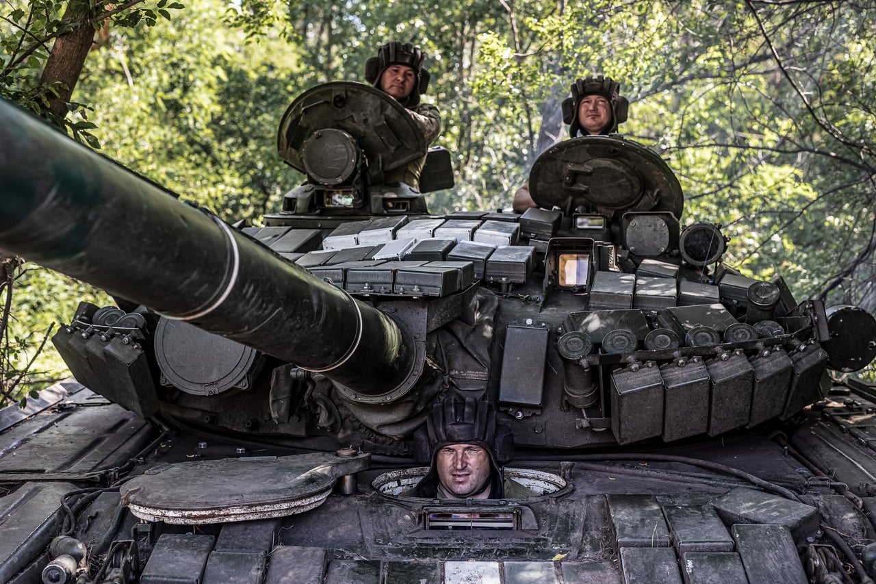 Ukrainian soldiers of the 4th Brigade operate a tank during military training in southern Donetsk Oblast, Ukraine on July 18.