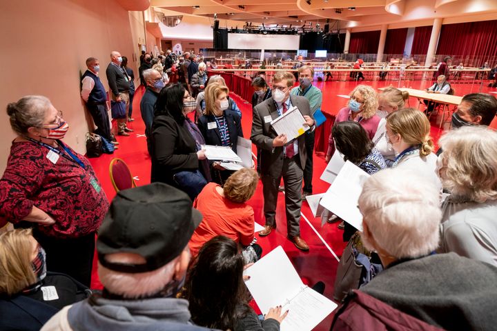 An attorney representing Donald Trump gives instructions to poll observers before the presidential recount vote for Dane County on Nov. 20, 2020, in Madison, Wisconsin.