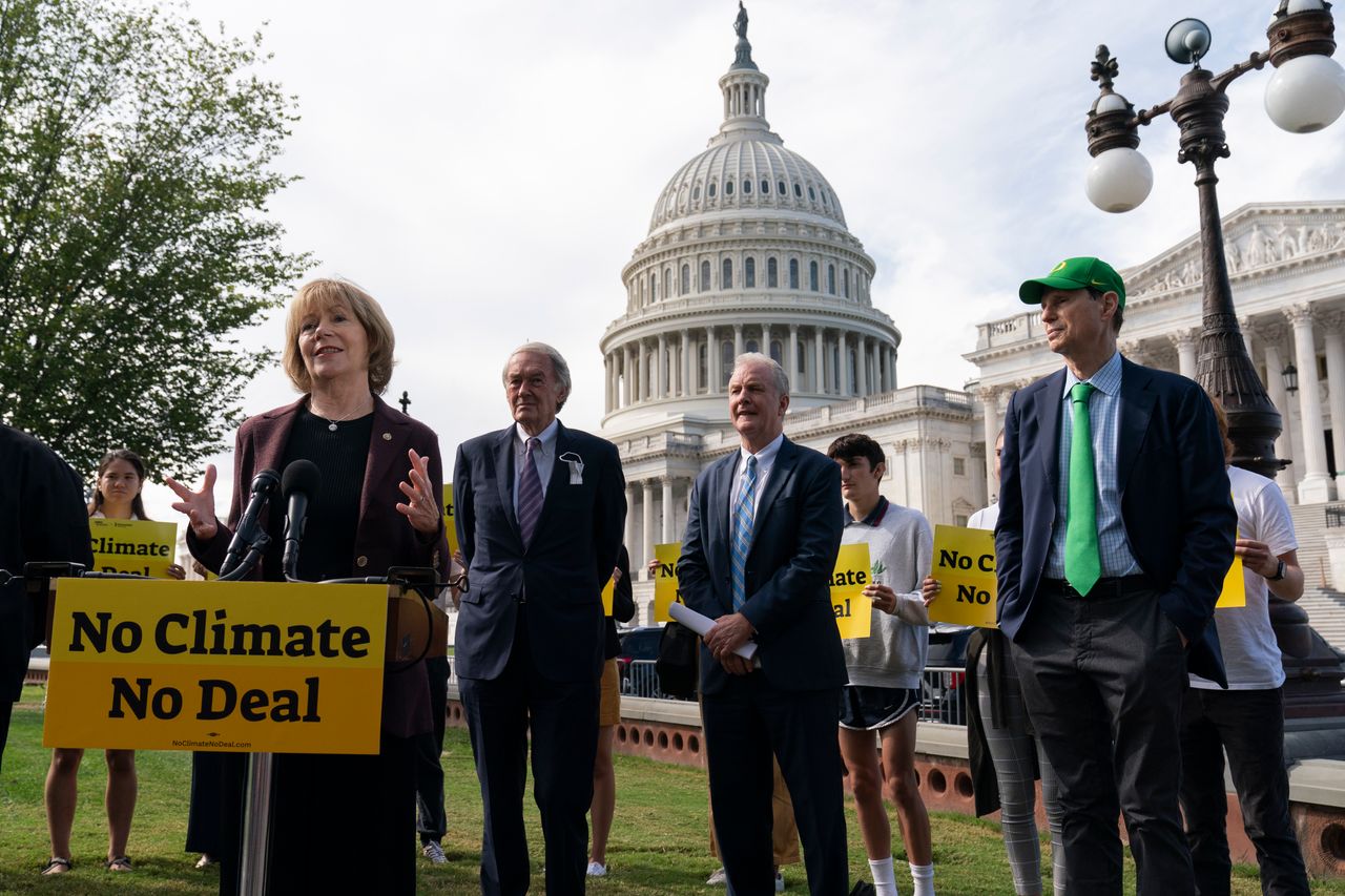 Smith helps to lead a climate change news conference outside the Capitol on Oct. 17, 2021, with other Democratic senators. Her background as an organizer lends itself well to working with advocacy groups at events like this.