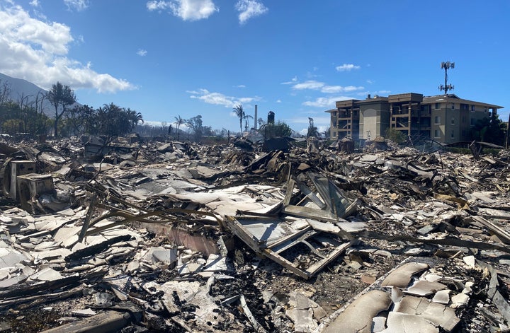 Destroyed buildings and homes are pictured in the aftermath of a wildfire in Lahaina, western Maui, Hawaii on August 11, 2023. A wildfire that left Lahaina in charred ruins has killed at least 55 people, authorities said on August 10, making it one of the deadliest disasters in the US state's history. Brushfires on Maui, fueled by high winds from Hurricane Dora passing to the south of Hawaii, broke out August 8 and rapidly engulfed Lahaina. (Photo by Paula RAMON / AFP) / "The erroneous mention[s] appearing in the metadata of this photo by Paula RAMON has been modified in AFP systems in the following manner: [August 11] instead of [August 10]. Please immediately remove the erroneous mention[s] from all your online services and delete it (them) from your servers. If you have been authorized by AFP to distribute it (them) to third parties, please ensure that the same actions are carried out by them. Failure to promptly comply with these instructions will entail liability on your part for any continued or post notification usage. Therefore we thank you very much for all your attention and prompt action. We are sorry for the inconvenience this notification may cause and remain at your disposal for any further information you may require." (Photo by PAULA RAMON/AFP via Getty Images)