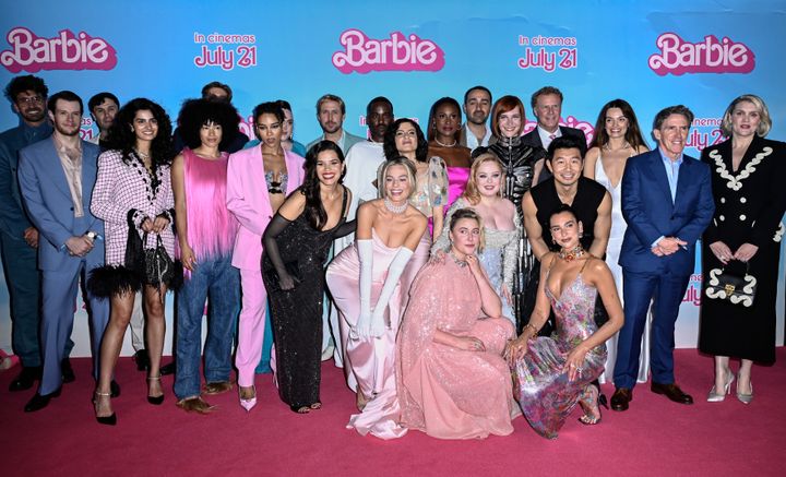 Rob posing with the cast of Barbie and its director, Greta Gerwig