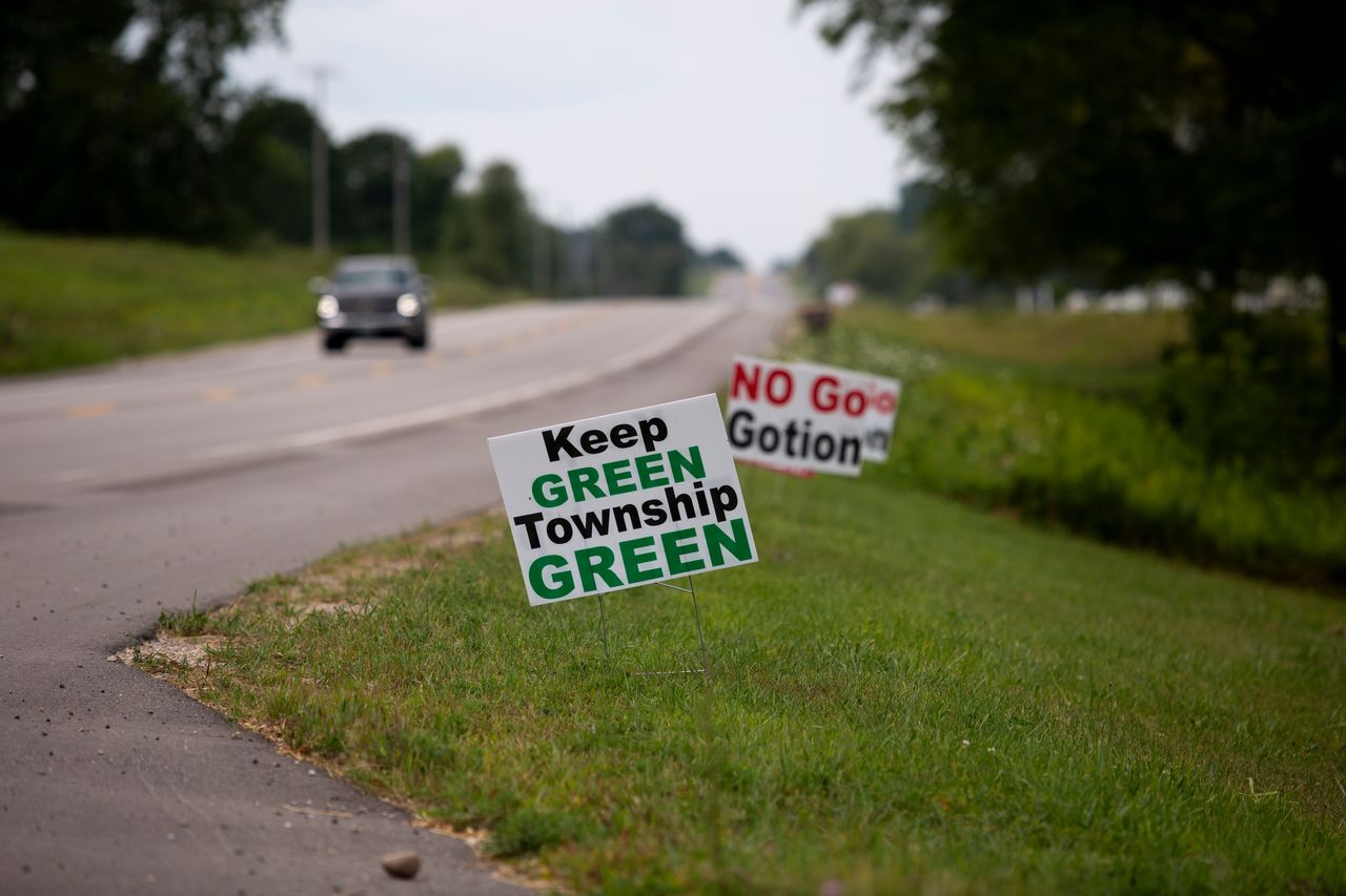 Anti-Gotion signs dot a road in Green Township. Many experts say EV battery production is “relatively benign” by manufacturing standards, but that most industrial processes can be dangerous without proper safeguards and vigilant oversight.