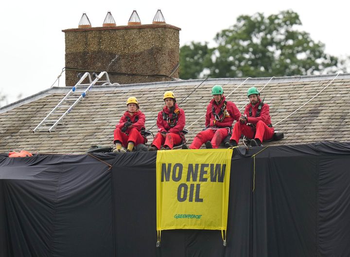 A more modern protest against fossil fuels – Greenpeace activists on the roof of Prime Minister Rishi Sunak's house in protest at his backing for expansion of North Sea oil and gas drilling.