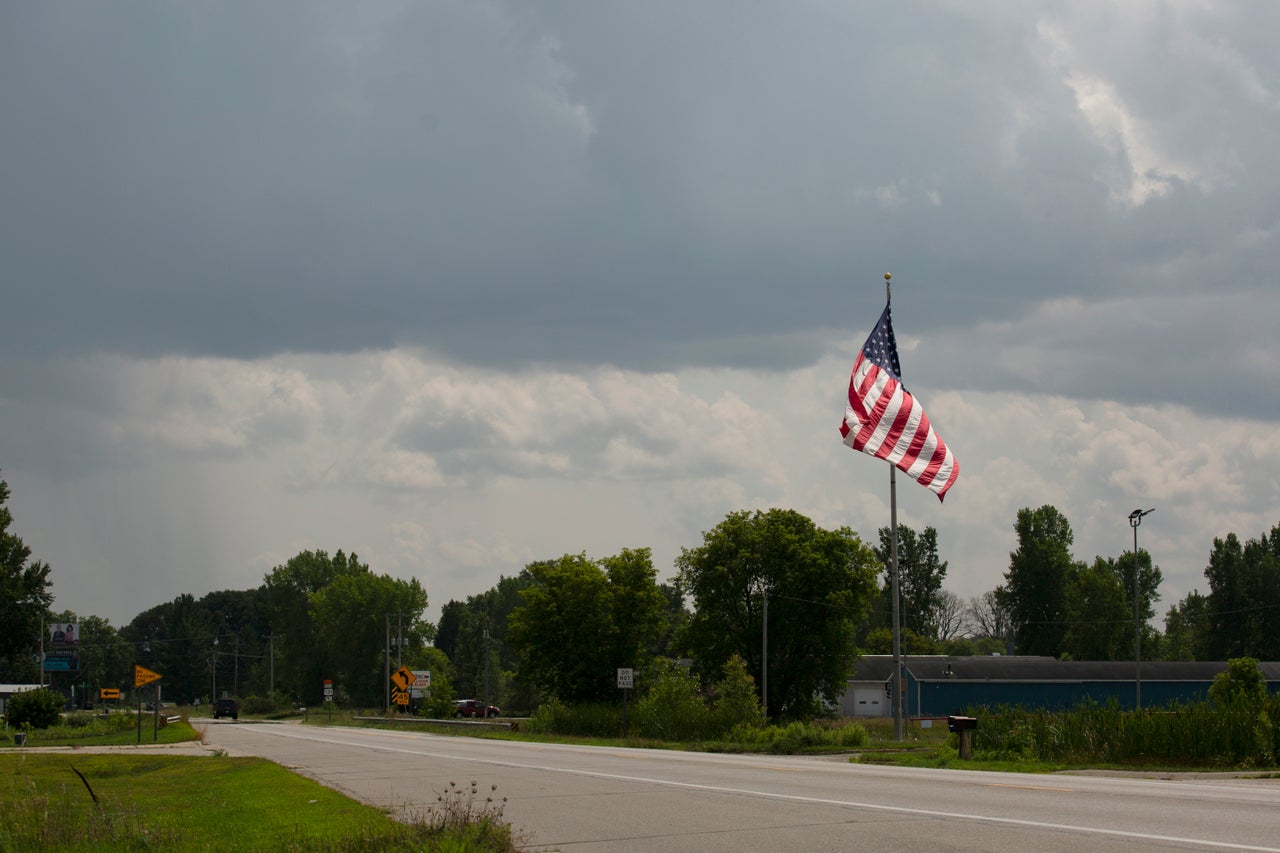 The main road in Green Township, with clouds on the horizon.