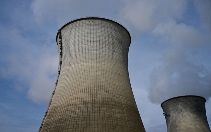 This photograph taken on July 24, 2023, shows cooling towers at the Bugey Nuclear Power Plant in Bugey in the Saint-Vulbas commune, eastern France.