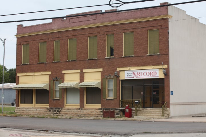 The offices of the Marion County Record sit across from the Marion County Courthouse in Marion, Kan., Sunday, Aug. 13, 2023, in Marion, Kansas. Law enforcement officers raided the newspaper office and seized computers and employee cell phones in what Editor and Publisher Eric Meyer believes is an attempt to intimidate the newspaper as it examines local issues, including the police chief's background. (AP Photo/John Hanna)