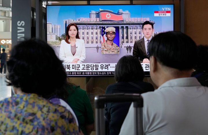 A TV screen shows a file image of American soldier Travis King during a news program at the Seoul Railway Station in Seoul, South Korea, Saturday, July 22, 2023. King bolted into North Korea while on a tour of the Demilitarized Zone on Tuesday, a day after he was supposed to travel to a base in the U.S. (AP Photo/Ahn Young-joon)