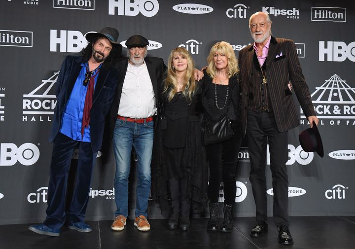 Mike Campbell, John McVie, inductee Stevie Nicks, Christine McVie and Mick Fleetwood of Fleetwood Mac pose in the press room during the 2019 Rock & Roll Hall of Fame induction ceremony.