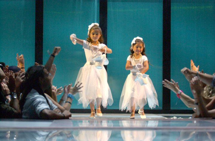 The performance began with an appearance from two flower girls