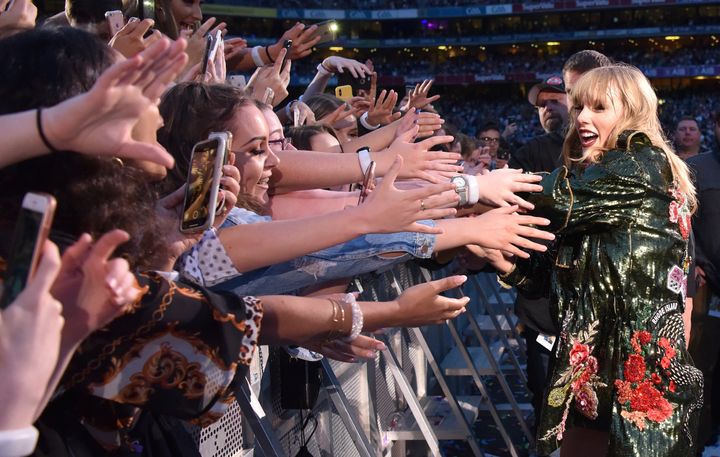 Taylor Swift, pictured here in 2018 in Dublin, Ireland, has been called a “genius” at cultivating parasocial relationships. That may be why her fans are so invested in her dating life.