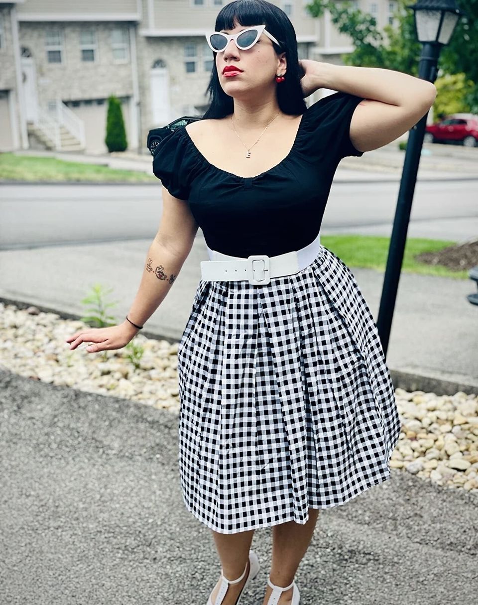 A pleated gingham skirt you'll be especially glad to have for all your dates to the drive-in movie theater