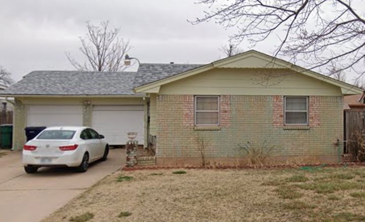 The Oklahoma City home where three children and their mother were fatally shot Wednesday. Police suspect that the children's father carried out the shootings before killing himself.