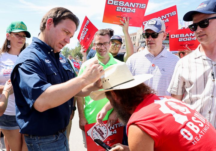 Florida Gov. Ron DeSantis, shown here at the Iowa State Fair, has been laying off the word "woke," which he once used in a speech seven times in 26 seconds.