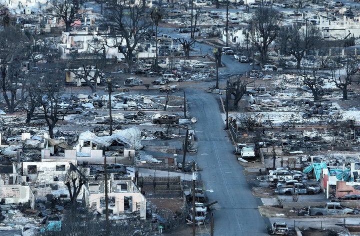 Burned cars and homes are seen in a neighborhood that was destroyed by a wildfire on Aug. 18 in Lahaina, Hawaii.