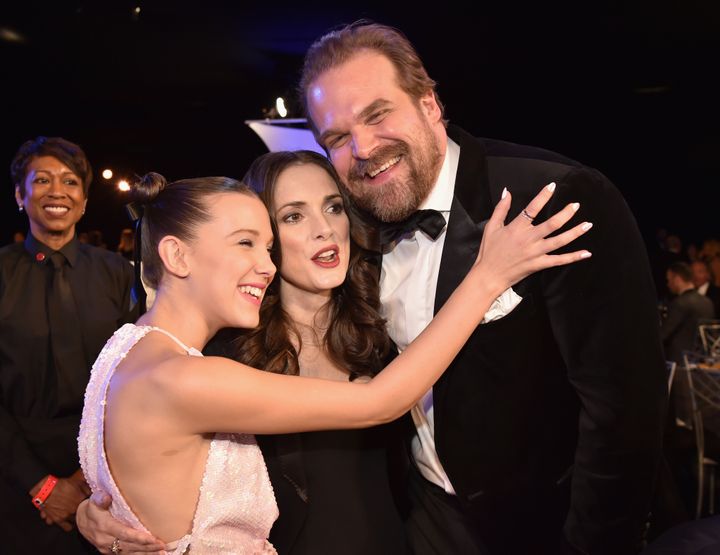 David with co-stars Millie Bobby Brown and Winona Ryder in 2018