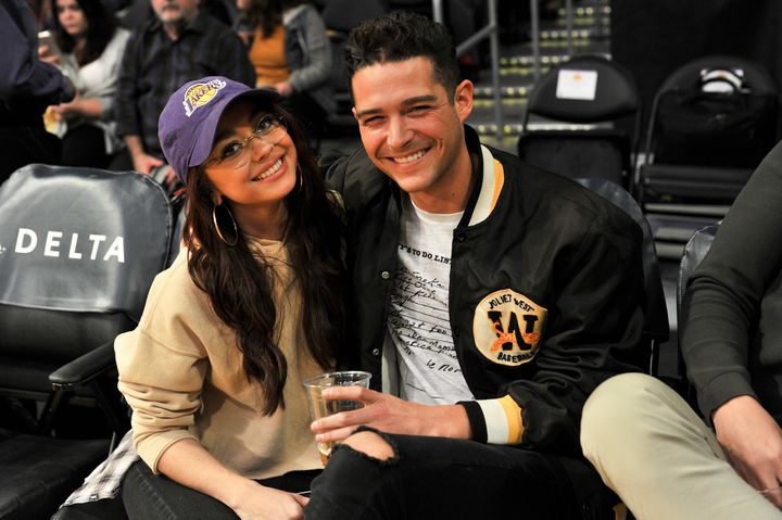 Sarah Hyland and Wells Adams attend a basketball game between the Los Angeles Lakers and the Chicago Bulls at Staples Center on Nov. 21, 2017 in Los Angeles.