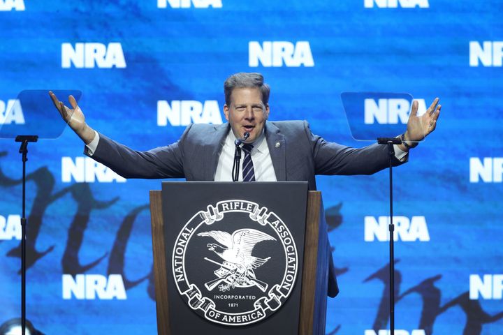 New Hampshire Gov. Chris Sununu, pictured at an NRA event in April 2023, wants to narrow the GOP field to defeat front-runner Donald Trump.
