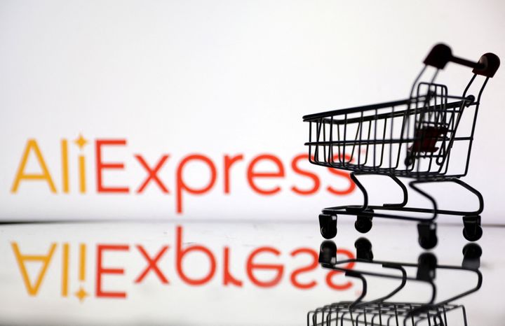 Shopping trolley is seen in front of AliExpress logo in this illustration, July 24, 2022. REUTERS/Dado Ruvic/Illustration