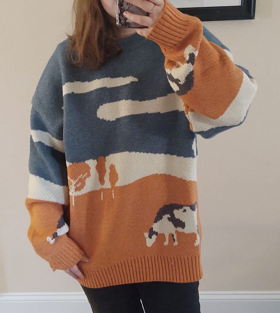 A grassland, knitted jumper that'll have everyone ~m~ooing and aahing when they see it! This cutie has the perfect oversized look for anyone who wants to stay warm and cozy.