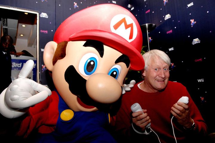 The voice of Super Mario, Charles Martinet, poses with Mario in London.