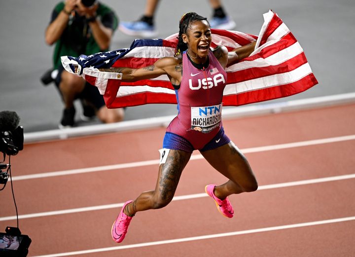 Sha'Carri Richardson of the United States celebrates after the women's 100m final of the World Athletics Championships.