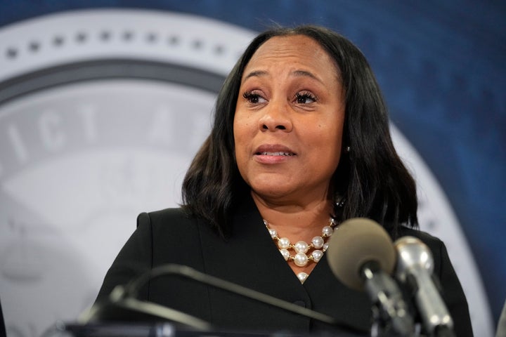 Fulton County District Attorney Fani Willis speaks in the Fulton County Government Center during a news conference, Monday, Aug. 14, 2023, in Atlanta. Donald Trump and several allies have been indicted in Georgia over efforts to overturn his 2020 election loss in the state.