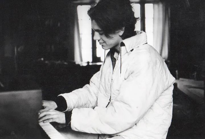 Chris in his younger years at the piano.