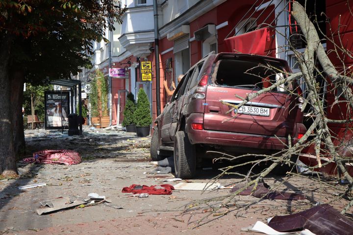 A car on the central square of Ukrainian city of Chernihiv lies wrecked by a missile strike on Aug. 19.