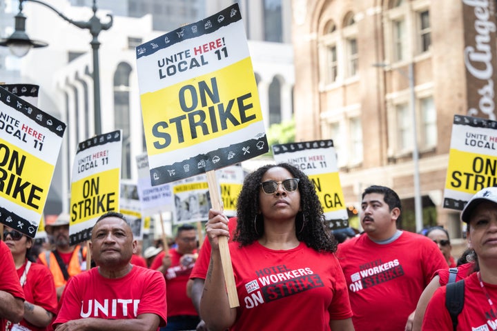 Strikers at the Intercontinental Los Angeles last month.  Unite Here Local 11 is demanding an immediate $5 raise for hotel workers.