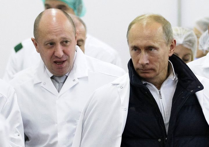 FILE - Yevgeny Prigozhin, left, shows Russian President Vladimir Putin, around his factory which produces school meals, outside St. Petersburg, Russia on Sept. 20, 2010. Prigozhin made his name as the profane and brutal mercenary boss who mounted an armed rebellion that was the most severe and shocking challenge to Russian President Vladimir Putin’s rule. (Alexei Druzhinin, Sputnik, Kremlin Pool Photo via AP, File)