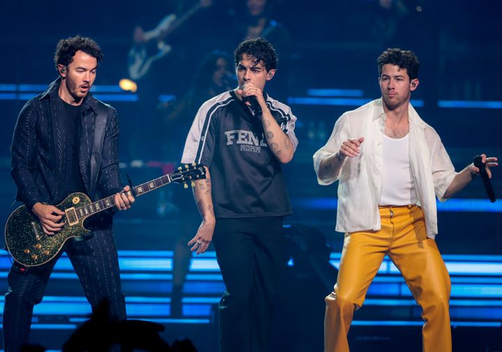 From left to right: Kevin, Joe and Nick Jonas perform in Boston on Aug. 15.