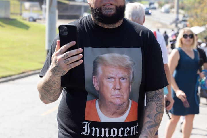 Supporters of former President Donald Trump gather outside of the Fulton County Jail ahead of Trump's surrender on Thursday in Atlanta, Georgia.
