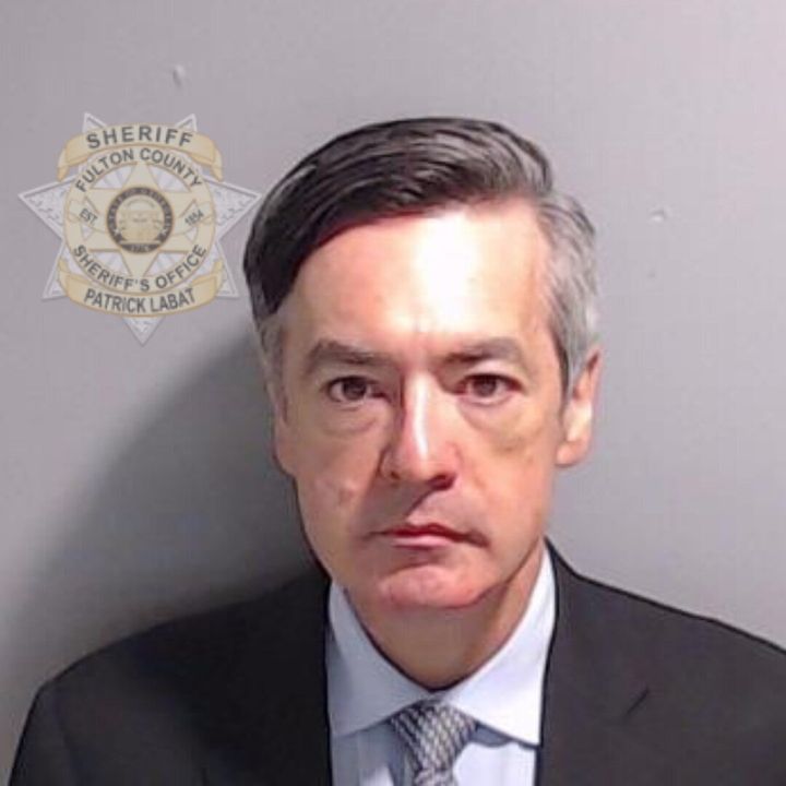 Former Trump lawyer Kenneth Chesebro poses for his booking photo on Wednesday in Atlanta, Georgia. Chesebro filed for a speedy trial after surrendering to law enforcement.