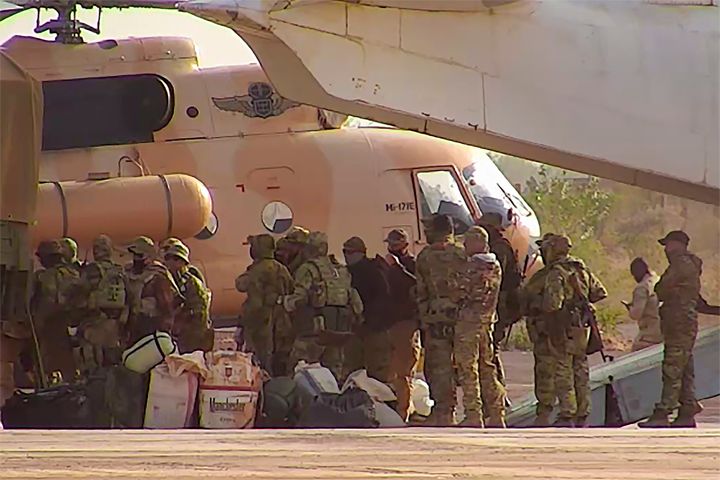 This undated photograph handed out by French military shows Russian mercenaries boarding a helicopter in northern Mali. Russia's Wagner Group, a private military company led by Yevgeny Prigozhin, has played a key role in the fighting in Ukraine and also deployed its personnel to Syria, Central African Republic, Libya and Mali. (French Army via AP, File)
