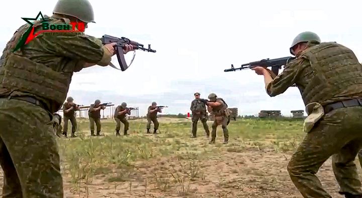 In this photo taken from video released by Belarusian Defense Ministry via VoenTV on Friday, July 14, 2023, Belarusian soldiers attend a training by mercenary fighters from Wagner private military company near Tsel village, about 90 kilometers (about 55 miles) southeast of Minsk, Belarus. The private military contractor has sent forces to Syria, Ukraine and several African countries but its future is uncertain following the presumed death of its head, Yevgeny Prigozhin. (Belarusian Defense Ministry via VoenTV via AP, File)
