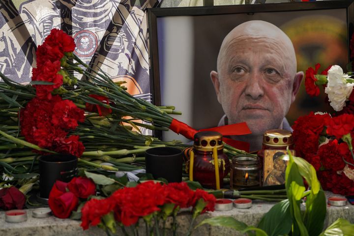 MOSCOW, RUSSIA - AUGUST 25: People lay carnations to a memorial as they pay tribute to Yevgeny Prigozhin who died in a plane crash, in Moscow, Russia on August 25, 2023. (Photo by Pelagiya Tihonova/Anadolu Agency via Getty Images)