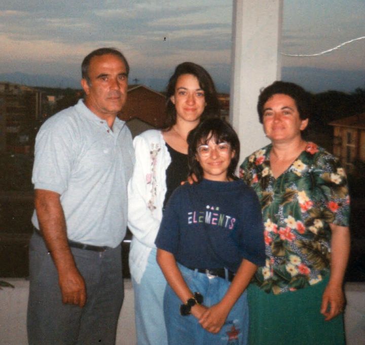 The author and her family (pictured from left: the author’s father, her sister, the author, and the author’s mom) during a trip to Italy in 1993. “We’re at my uncle's home in Milan,” she writes. “I was 12.”