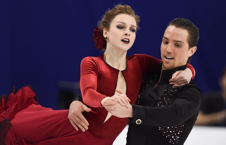 Alexandra paul and mitchell islam of canada perform at the isu world figure skating championships in shanghai on march 25, 2015.