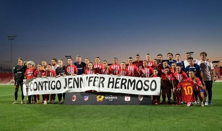 Atletico Madrid players and staff hold a banner in support of Spain's Jennifer Hermoso before their match against AC Milan as FIFA suspended President of the Royal Spanish Football Federation Luis Rubiales after the Women's World Cup Final.