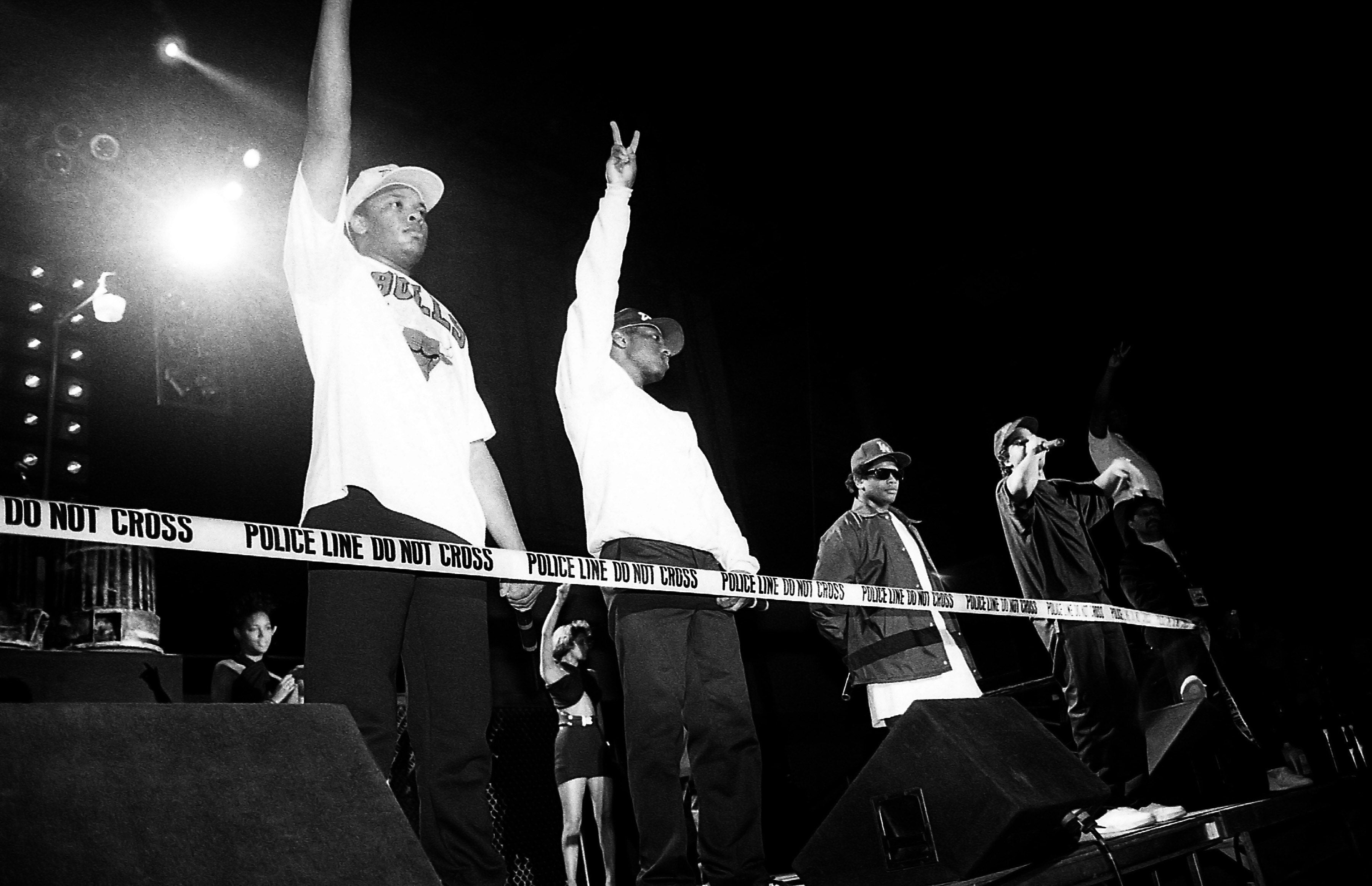 Dr. Dre, MC Ren, Eazy-E and Ice Cube from N.W.A. perform during the 'Straight Outta Compton' tour at the Genesis Convention Center in Gary, Indiana in July 1989.