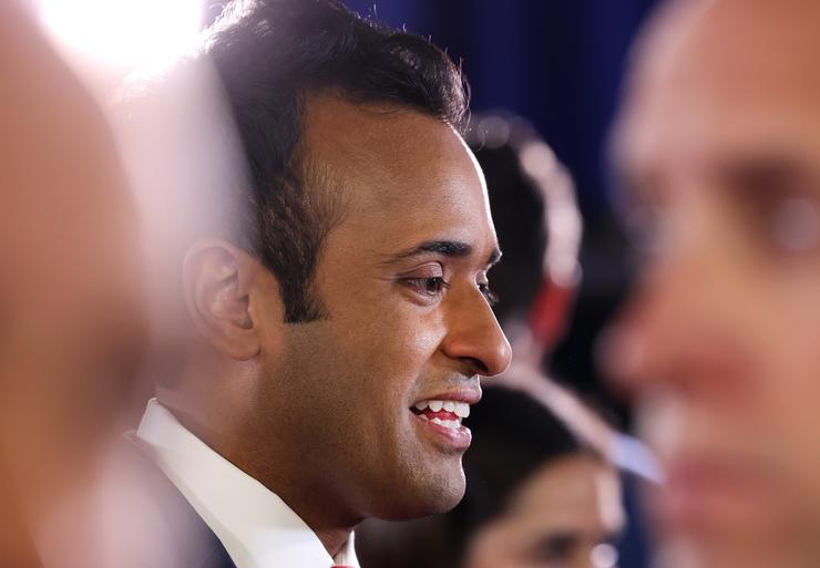 Republican presidential candidate Vivek Ramaswamy talks to members of the media in the spin room following the first debate of the GOP primary season, Aug. 23, 2023, in Milwaukee.
