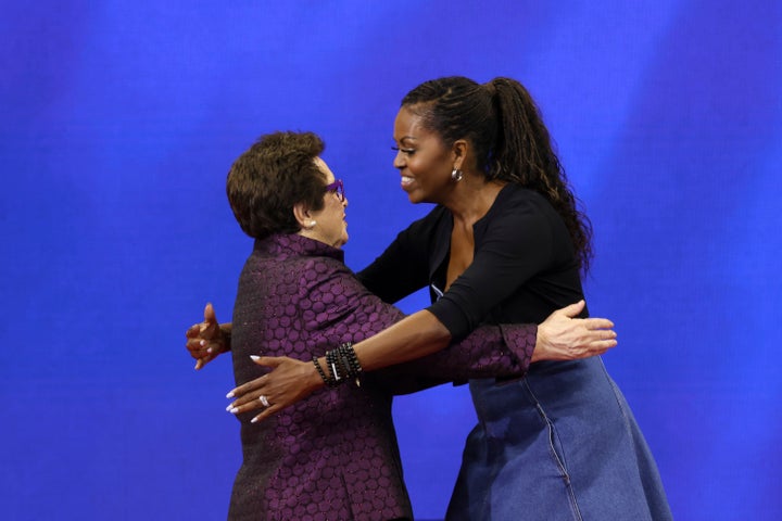 Former first lady Michelle Obama (right) and tennis legend Billie Jean King embrace during the opening ceremony of the U.S. Open tennis championships Monday in New York.