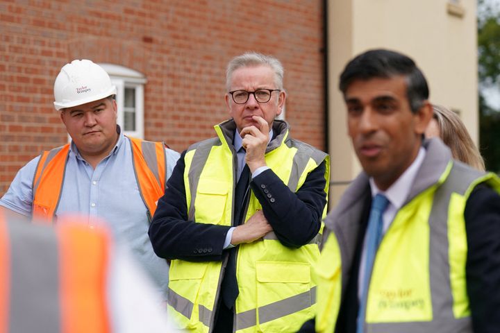 Rishi Sunak and Michael Gove visit a Taylor Wimpey housing development in Norwich on Tuesday.