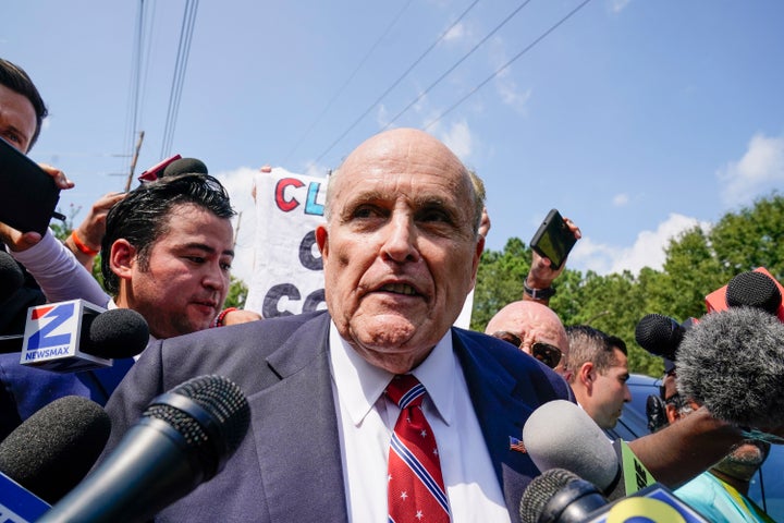 Rudy Giuliani is seen outside the Fulton County Jail in Atlanta on Aug. 23. The former Donald Trump attorney was one of 19 people arrested last week after being accused of conspiring to change the results in the 2020 presidential election in Georgia.