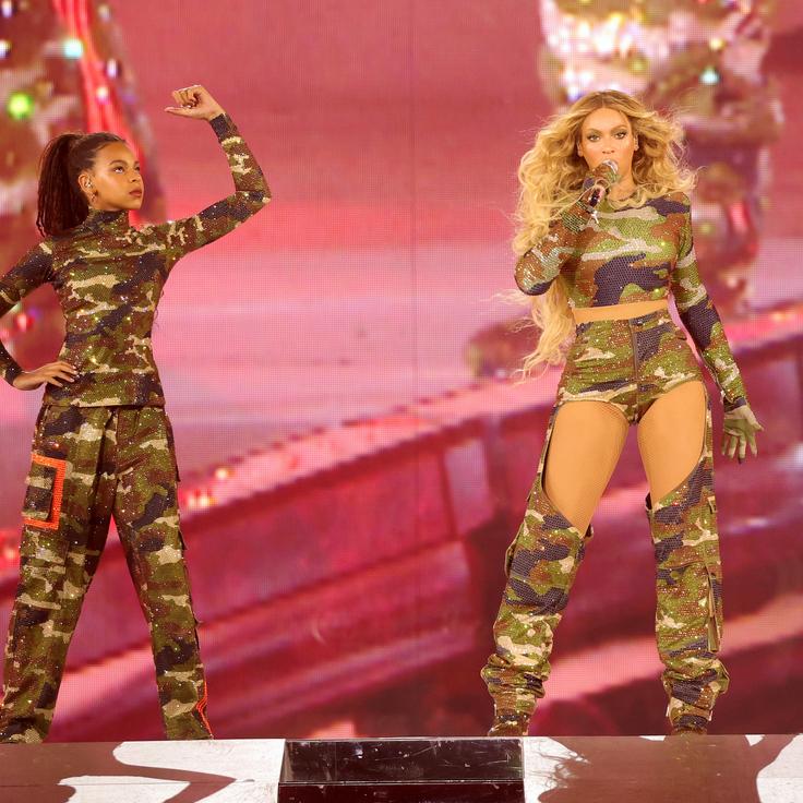 Blue Ivy Carter and Beyoncé perform onstage during the Renaissance World Tour at Mercedes-Benz Stadium on Aug. 11 in Atlanta, Georgia. 