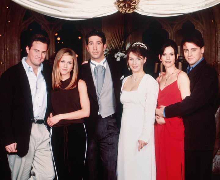 Helen Baxendale, in the wedding dress, with core cast members Matthew Perry, Jennifer Aniston, David Schwimmer, Courteney Cox and Matt LeBlanc.