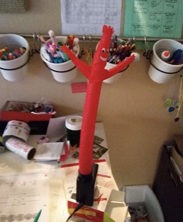 A mini waving inflatable tube man that'll make them want to throw their hands up in the air and yell "WOOHOO!"